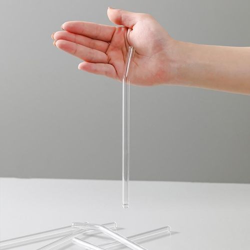 4-pack of high borosilicate transparent glass straws, heat-resistant and durable, with a free brush
