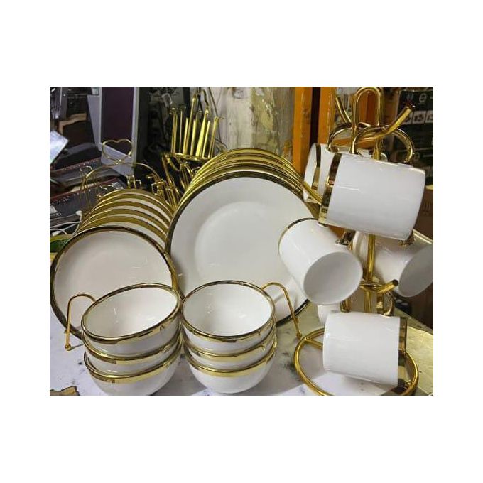 Gold and white ceramic dinner set