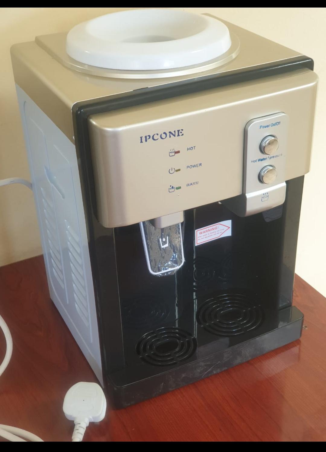 Ipcone table top water dispenser.
